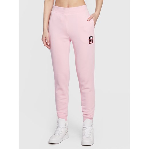 Tommy Hilfiger Spodnie dresowe Monogram Emb WW0WW37435 Różowy Regular Fit ze sklepu MODIVO w kategorii Spodnie damskie - zdjęcie 182619056