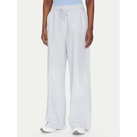 Tommy Jeans Spodnie materiałowe DW0DW20352 Niebieski Regular Fit ze sklepu MODIVO w kategorii Spodnie damskie - zdjęcie 182619505
