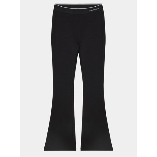 Calvin Klein Jeans Spodnie materiałowe Logo Tape IG0IG02292 Czarny Flare Fit ze sklepu MODIVO w kategorii Spodnie dziewczęce - zdjęcie 182620295