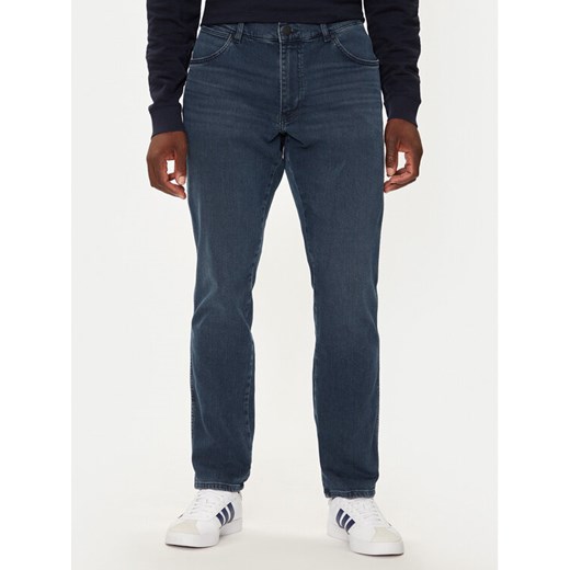 Wrangler Jeansy River 112356840 Granatowy Tapered Fit ze sklepu MODIVO w kategorii Jeansy męskie - zdjęcie 182621396