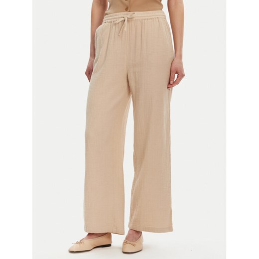 ONLY Spodnie dzianinowe Thyra 15296375 Beżowy Comfort Fit ze sklepu MODIVO w kategorii Spodnie damskie - zdjęcie 182622307