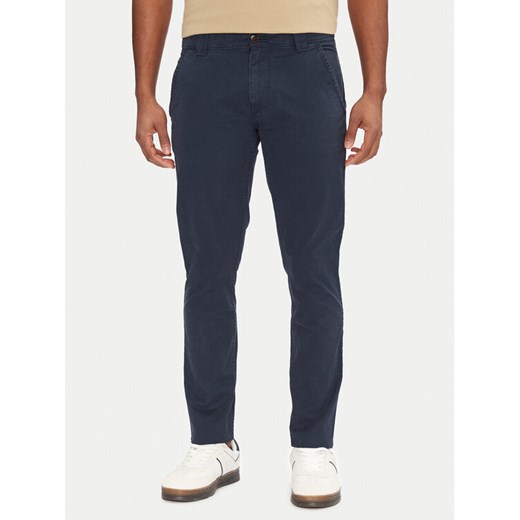 Tommy Jeans Chinosy Tjm Scanton DM0DM09595 Granatowy Slim Fit ze sklepu MODIVO w kategorii Spodnie męskie - zdjęcie 182622946
