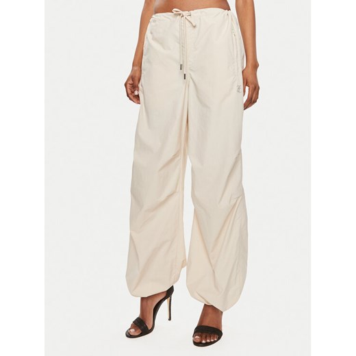 Juicy Couture Spodnie materiałowe Ayla JCWBJ24341 Beżowy Oversize ze sklepu MODIVO w kategorii Spodnie damskie - zdjęcie 182623707