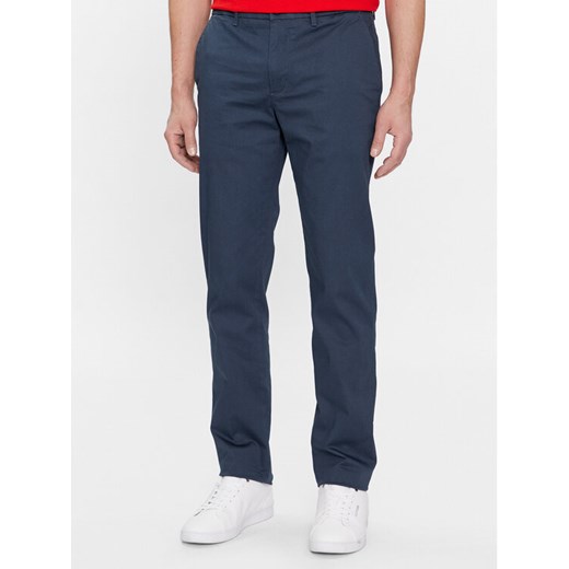 Tommy Hilfiger Chinosy Denton MW0MW33938 Granatowy Slim Fit ze sklepu MODIVO w kategorii Spodnie męskie - zdjęcie 182623818