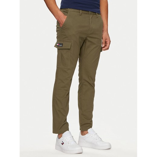 Tommy Jeans Spodnie materiałowe Austin DM0DM18940 Zielony Slim Fit ze sklepu MODIVO w kategorii Spodnie męskie - zdjęcie 182623827