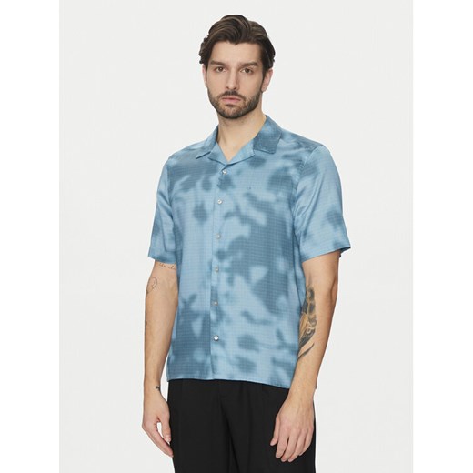 Calvin Klein Koszula K10K114190 Niebieski Regular Fit ze sklepu MODIVO w kategorii Koszule męskie - zdjęcie 182623829