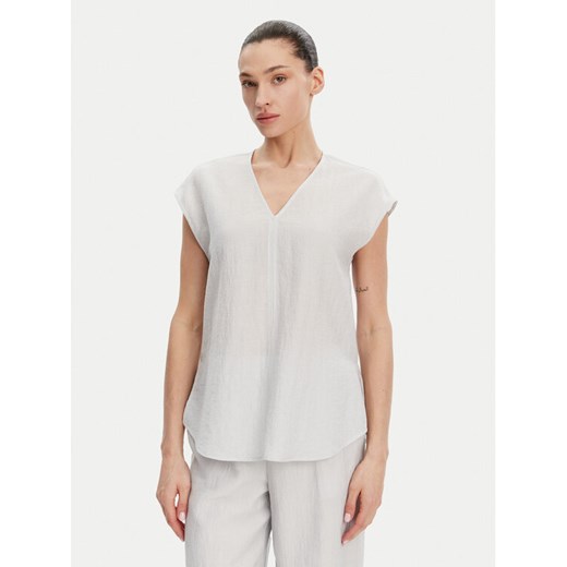 Calvin Klein Bluzka K20K208210 Błękitny Regular Fit ze sklepu MODIVO w kategorii Bluzki damskie - zdjęcie 182623955