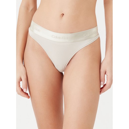 Calvin Klein Underwear Stringi 000QF7997E Beżowy ze sklepu MODIVO w kategorii Majtki damskie - zdjęcie 182624396