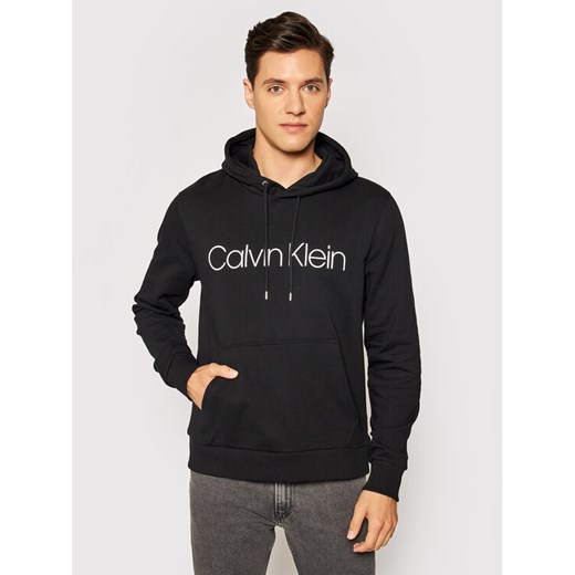 Calvin Klein Bluza Logo K10K104060 Czarny Regular Fit ze sklepu MODIVO w kategorii Bluzy męskie - zdjęcie 182625109