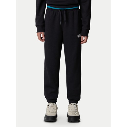 The North Face Spodnie dresowe NF0A8BHT Czarny Regular Fit ze sklepu MODIVO w kategorii Spodnie chłopięce - zdjęcie 182625427