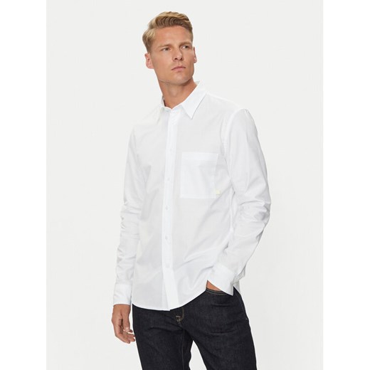 Calvin Klein Jeans Koszula J30J326182 Biały Regular Fit ze sklepu MODIVO w kategorii Koszule męskie - zdjęcie 182626476