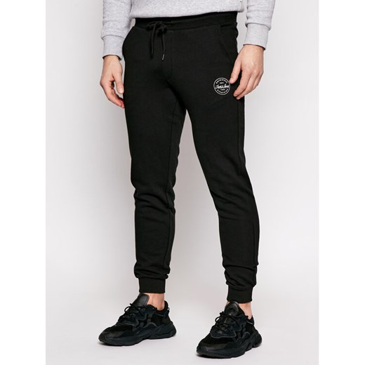 Jack&Jones Spodnie dresowe Gordon 12165322 Czarny Regular Fit ze sklepu MODIVO w kategorii Spodnie męskie - zdjęcie 182626646