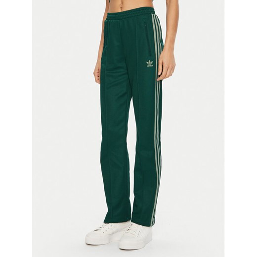 adidas Spodnie dresowe Beckenbauer JC5794 Zielony Regular Fit ze sklepu MODIVO w kategorii Spodnie damskie - zdjęcie 182627536