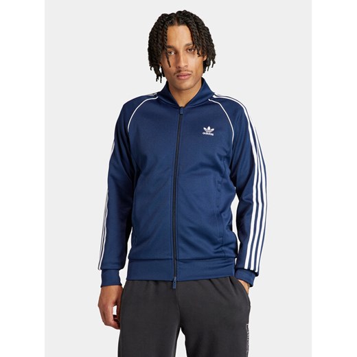 adidas Bluza adicolor Classics SST IR9866 Niebieski Slim Fit ze sklepu MODIVO w kategorii Bluzy męskie - zdjęcie 182628137