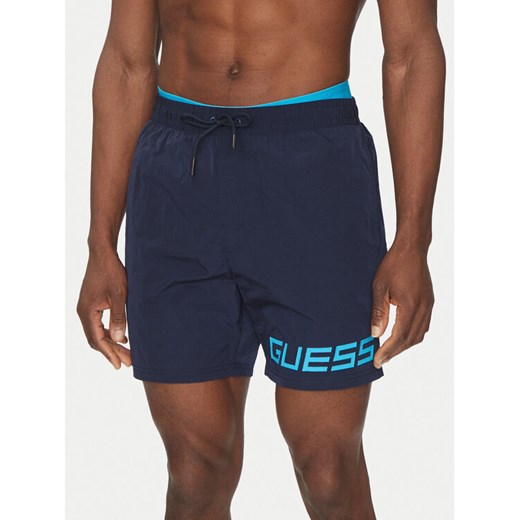 Guess Szorty kąpielowe F5GT12 WH1C2 Granatowy Regular Fit ze sklepu MODIVO w kategorii Kąpielówki - zdjęcie 182628429