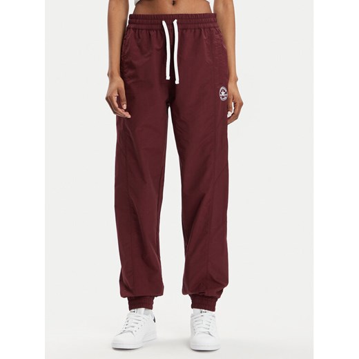 Converse Spodnie dresowe Star Printer 10026055-A02 Bordowy Tapered Fit ze sklepu MODIVO w kategorii Spodnie damskie - zdjęcie 182628435