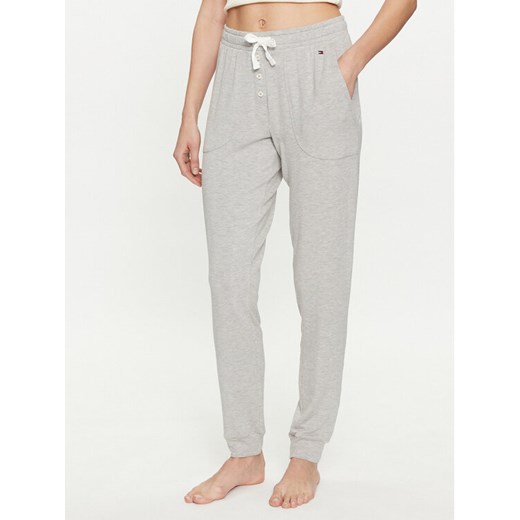 Tommy Hilfiger Spodnie dresowe UW0UW05192 Szary Slim Fit ze sklepu MODIVO w kategorii Spodnie damskie - zdjęcie 182628725