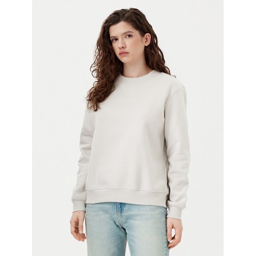 Calvin Klein Jeans Bluza Institutional Graphic J20J224731 Beżowy Regular Fit ze sklepu MODIVO w kategorii Bluzy damskie - zdjęcie 182629855
