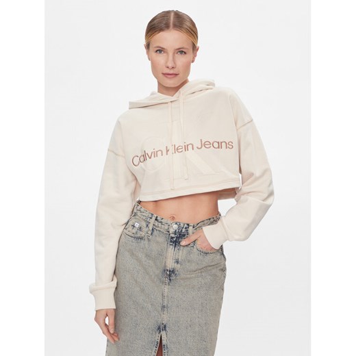 Calvin Klein Jeans Bluza Hero Monologo Short Hoodie J20J222540 Écru Regular Fit ze sklepu MODIVO w kategorii Bluzy damskie - zdjęcie 182629975