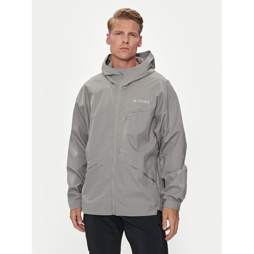 adidas Wiatrówka Terrex Xploric IK9115 Szary Regular Fit ze sklepu MODIVO w kategorii Kurtki męskie - zdjęcie 182630496
