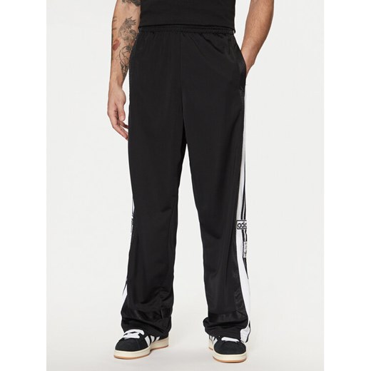 adidas Spodnie dresowe Adibreak JD4267 Czarny Loose Fit ze sklepu MODIVO w kategorii Spodnie męskie - zdjęcie 182631066