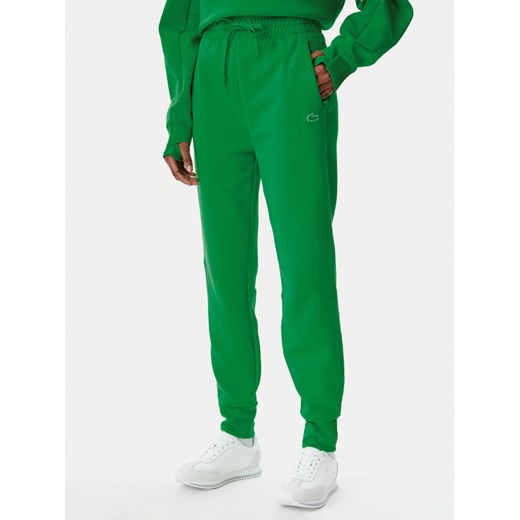 Lacoste Spodnie dresowe XF0343 Zielony Regular Fit ze sklepu MODIVO w kategorii Spodnie damskie - zdjęcie 182632728