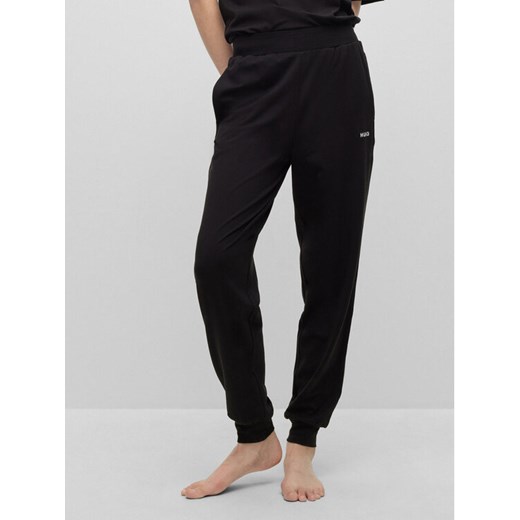 Hugo Spodnie dresowe 50490578 Czarny Regular Fit ze sklepu MODIVO w kategorii Spodnie damskie - zdjęcie 182632766