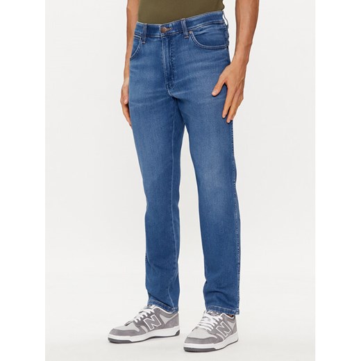 Wrangler Jeansy River 112352673 Niebieski Tapered Fit ze sklepu MODIVO w kategorii Jeansy męskie - zdjęcie 182632829
