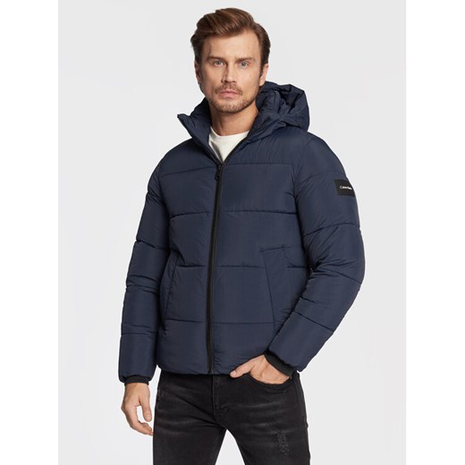 Calvin Klein Kurtka zimowa K10K110336 Granatowy Regular Fit ze sklepu MODIVO w kategorii Kurtki męskie - zdjęcie 182633215