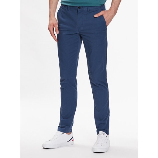 Tommy Hilfiger Chinosy Bleecker MW0MW26619 Granatowy Slim Fit ze sklepu MODIVO w kategorii Spodnie męskie - zdjęcie 182635008