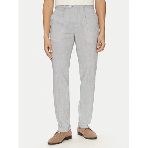 Marciano Guess Chinosy 5GHB17 2314Z Błękitny Slim Fit ze sklepu MODIVO w kategorii Spodnie męskie - zdjęcie 182637277