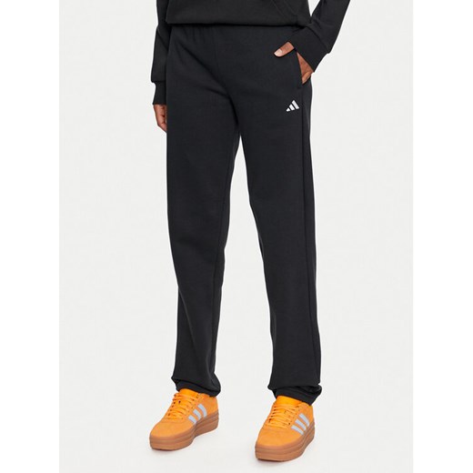 adidas Spodnie dresowe Essentials Small Logo IW0221 Czarny Regular Fit ze sklepu MODIVO w kategorii Spodnie damskie - zdjęcie 182637517