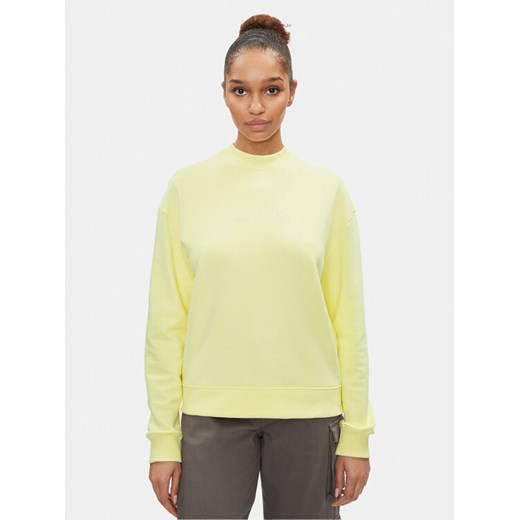 Calvin Klein Bluza Hero Logo K20K205450 Żółty Regular Fit ze sklepu MODIVO w kategorii Bluzy damskie - zdjęcie 182637829