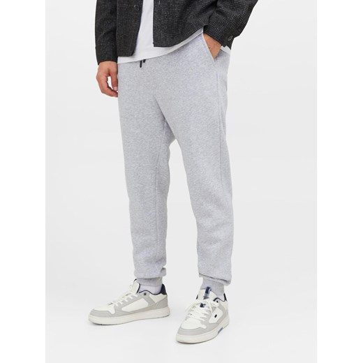 Jack&Jones Spodnie dresowe Gordon 12249274 Szary Regular Fit ze sklepu MODIVO w kategorii Spodnie męskie - zdjęcie 182637998