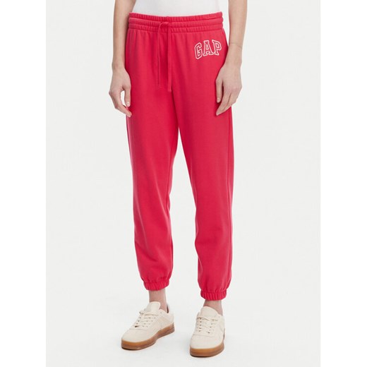 Gap Spodnie dresowe 889527-04 Różowy Relaxed Fit ze sklepu MODIVO w kategorii Spodnie damskie - zdjęcie 182638078