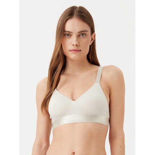Calvin Klein Underwear Biustonosz bezfiszbinowy 000QF7993E Beżowy ze sklepu MODIVO w kategorii Biustonosze - zdjęcie 182638309