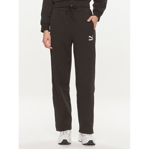 Puma Spodnie dresowe T7 624212 Czarny Relaxed Fit ze sklepu MODIVO w kategorii Spodnie damskie - zdjęcie 182638349