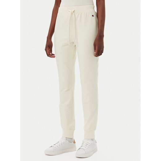 Champion Spodnie dresowe 118101 Écru Slim Fit ze sklepu MODIVO w kategorii Spodnie damskie - zdjęcie 182638795