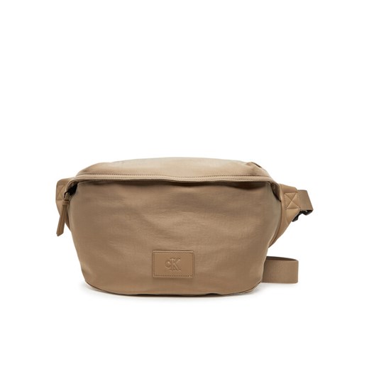 Calvin Klein Jeans Saszetka nerka Metro Oversized Waistbag Ny LV04G3088G Beżowy ze sklepu MODIVO w kategorii Nerki - zdjęcie 182640255