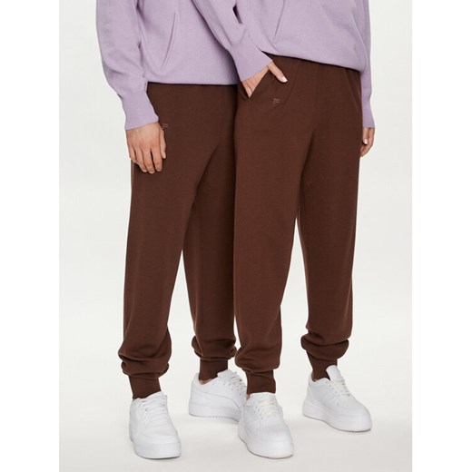 Pangaia Spodnie dresowe Merino Brązowy Regular Fit ze sklepu MODIVO w kategorii Spodnie męskie - zdjęcie 182640827