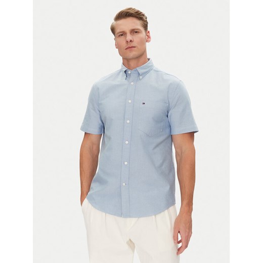 Tommy Hilfiger Koszula Heritage MW0MW36272 Błękitny Regular Fit ze sklepu MODIVO w kategorii Koszule męskie - zdjęcie 182642287