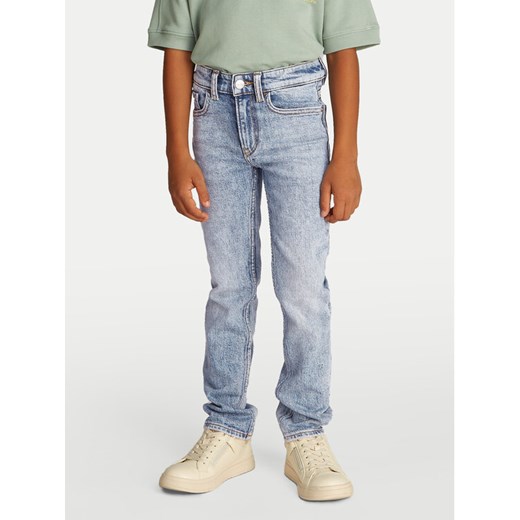 Calvin Klein Jeans Jeansy IB0IB02475 Niebieski Slim Fit ze sklepu MODIVO w kategorii Spodnie chłopięce - zdjęcie 182642806