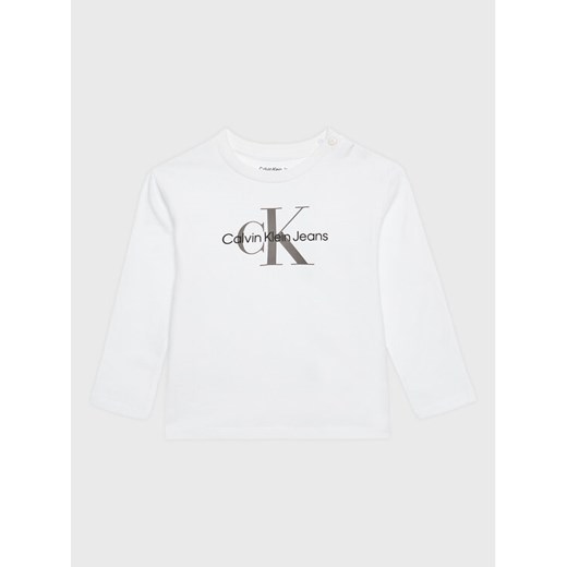Calvin Klein Jeans Bluzka Monogram IN0IN00005 Biały Regular Fit ze sklepu MODIVO w kategorii T-shirty chłopięce - zdjęcie 182642989