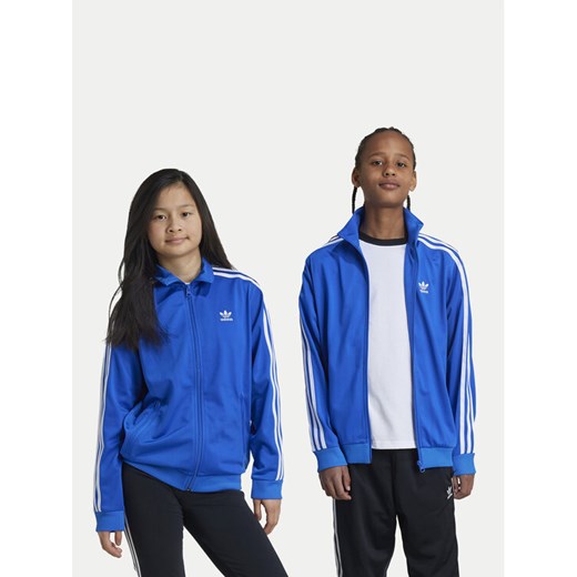 adidas Bluza Firebird IY9799 Niebieski Regular Fit ze sklepu MODIVO w kategorii Bluzy dziewczęce - zdjęcie 182643236