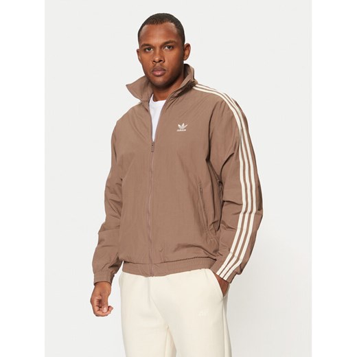 adidas Bluza adicolor Firebird JP1023 Beżowy Loose Fit ze sklepu MODIVO w kategorii Bluzy męskie - zdjęcie 182644208