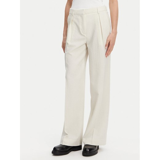 Calvin Klein Spodnie palazzo K20K208217 Beżowy Wide Leg ze sklepu MODIVO w kategorii Spodnie damskie - zdjęcie 182645428