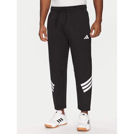 adidas Spodnie dresowe Future Icons 3-Stripes JD4889 Czarny Loose Fit ze sklepu MODIVO w kategorii Spodnie męskie - zdjęcie 182646019