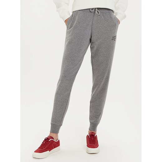 Tommy Hilfiger Spodnie dresowe UW0UW04522 Szary Regular Fit ze sklepu MODIVO w kategorii Spodnie damskie - zdjęcie 182646408