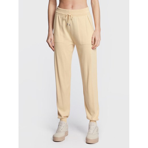 United Colors Of Benetton Spodnie dresowe 113CDF004 Beżowy Relaxed Fit ze sklepu MODIVO w kategorii Spodnie damskie - zdjęcie 182647556