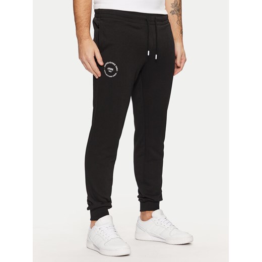 Jack&Jones Spodnie dresowe Gordon 12268442 Czarny Regular Fit ze sklepu MODIVO w kategorii Spodnie męskie - zdjęcie 182648317